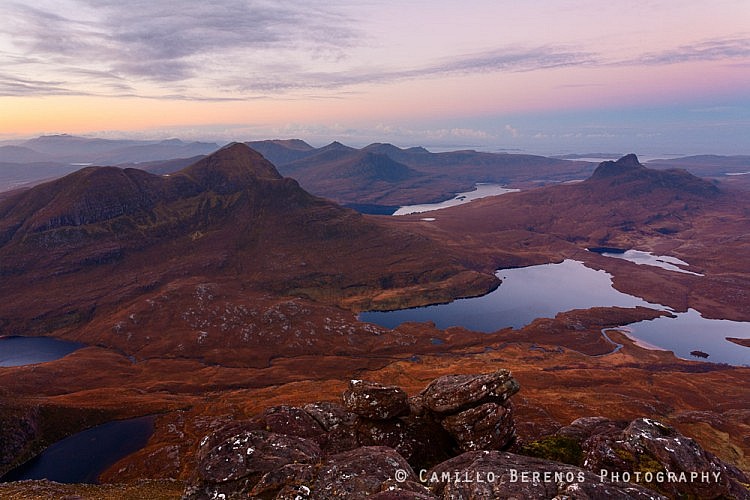 Cul Beag and Stac Pollaidh are here shown side by side, separated by Loch an Doire Dhuibh and towering above the Inverpolly landscape. While Stac Pollaidh is much lower, reaching its true summit is actually a relatively tricky scramble.