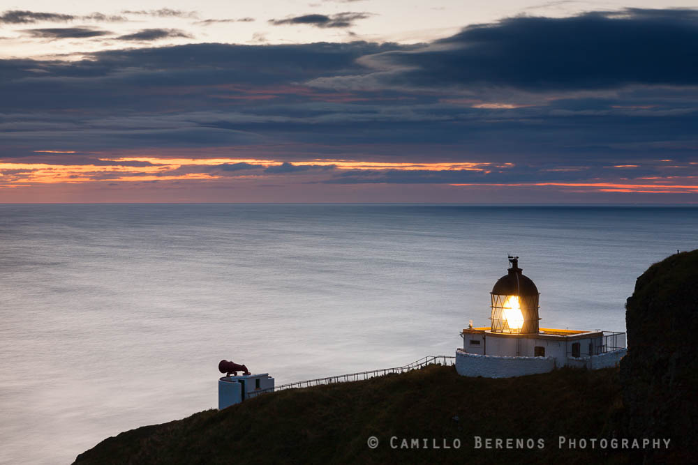 The lighthouse at St Abbs head during the blue hour at dawn.